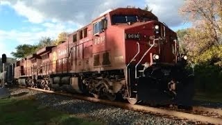 preview picture of video 'CP AC44CW 9614 and 9674 lead a 106-car oil train east through Minnesota City, Minnesota'
