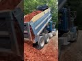 One of our Peterbilt dump trucks dumping a load in a tight spot! #peterbilt #dumptruck #dirt