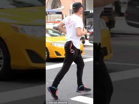 Chris Martin grins broadly enjoys break Coldplay s touring schedule jogging New York