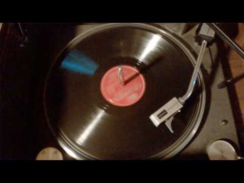 When Veronica plays the harmonica BY Kay Kysers vocals By Gloria wood