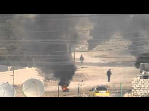 Rebels battle Syrian forces along border