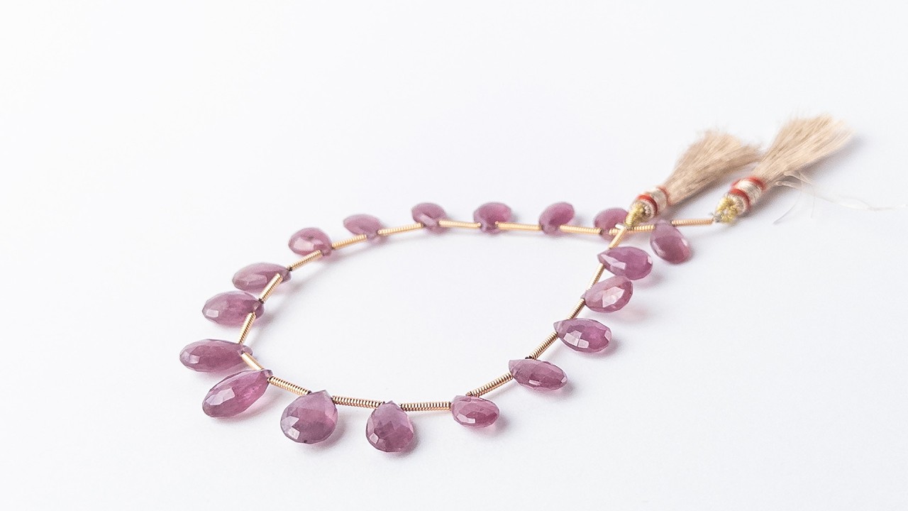 Ruby | Faceted Briolette | 6.6-7.6mm Bead Size | 18 Pieces | 55 Carats video