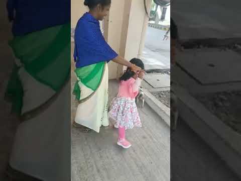 Anaisha playing with puppy