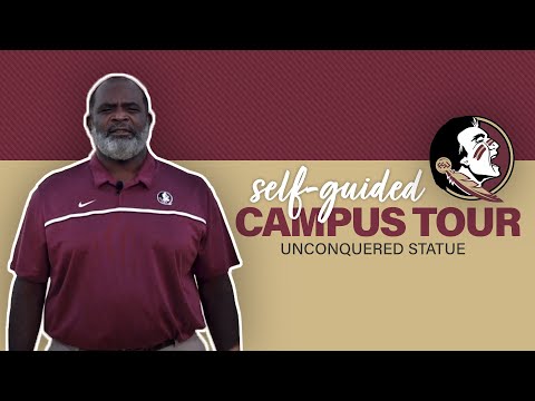FSU Self-Guided Campus Tour - Stop 1 Unconquered Statue at the Visitor Center w/ Coach Odell Haggins