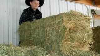 preview picture of video 'Ian pushin' his first bale...'