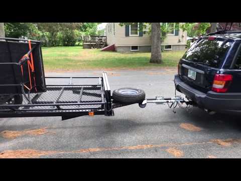 Part of a video titled How To Get a Utility Trailer To Stop Bouncing While Being Towed