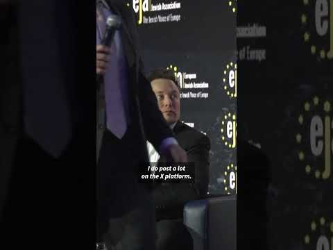 Video Thumbnail: Elon Musk visits Auschwitz, defends record on anti-Semitism | AFP #shorts