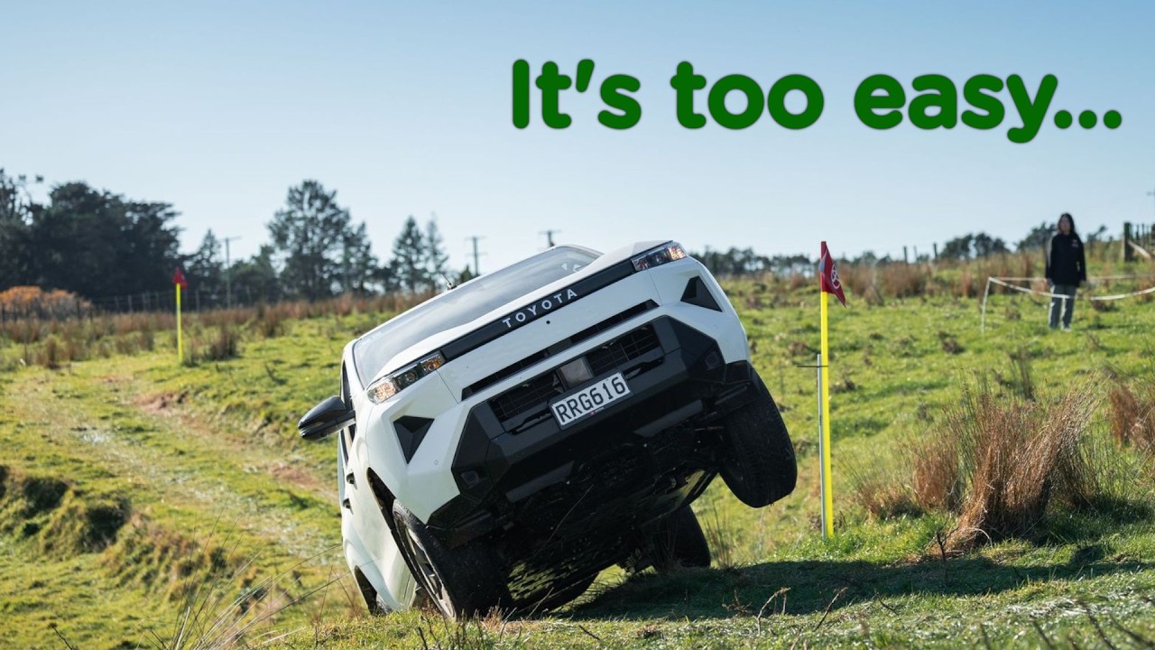 Toyota electric Hilux on a wet grass off-road course in New Zealand