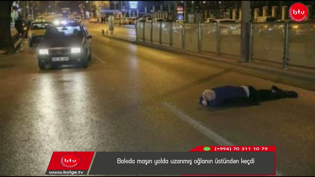 Bakıda maşın yolda uzanmış oğlanın üstündən keçdi