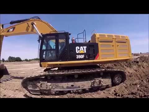 Cat 390F Loading Cat 740's and 745's