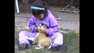 Girl Trains Dog (Beats it into Submission)