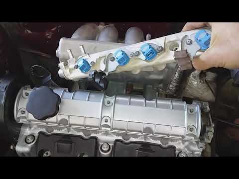 Extracción y colocación rampa de inyectores Renault F3P 1.8i