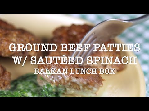 Ground beef patties and sauteed spinach