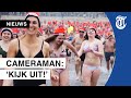 Gillende nieuwjaarsduikers bestormen koude zee