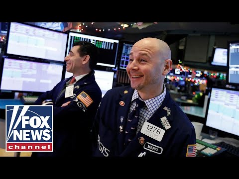 What do wild swings on Wall Street indicate about the economic outlook for 2019?