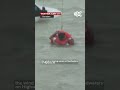 First responder rescue man from flood on Highway 288. "This is Hurricane Beryl for you, right here"