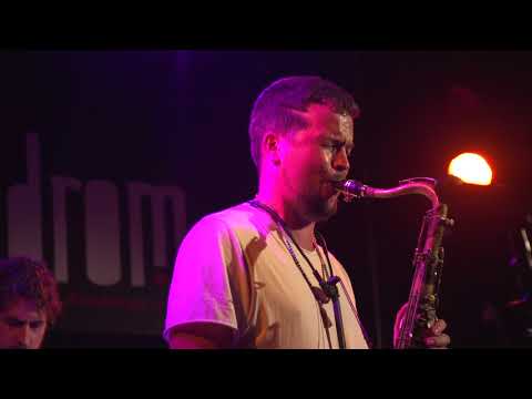 Slavo Rican Assembly Live! on stage