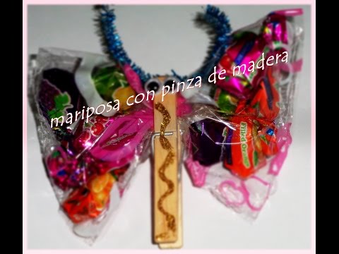 paso a paso de mariposa con dulces y pinza de ropa de madera