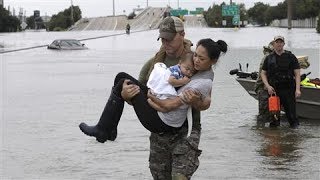 Emergency Crews Rescue Those Stranded in Harvey Flooding