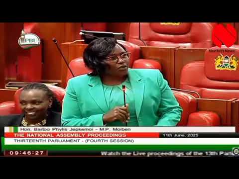 Moiben MP Phylis Bartoo welcomes village elders from her constituency on their visit to Parliament.