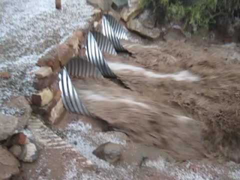 Flash flood in arroyo Camino de Milagro