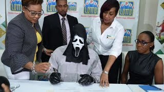 Lottery winner claims prize in Scream mask to hide identity