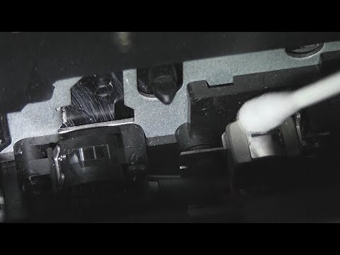 How to clean the heads and transport mechanism in a cassette deck - Tutorial video