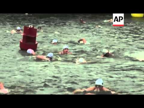 Dozens braved the cold weather and swam into the chilly waters of Vltava river in Prague as part of