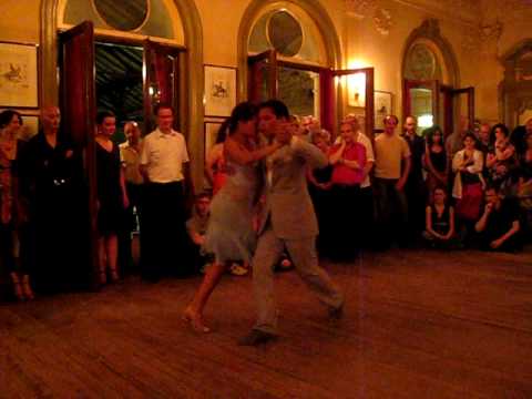  Octavio Fernandez  and  Samantha Dispari  are  dancing  to  the  milonga  "  Un Baile A Beneficio  "