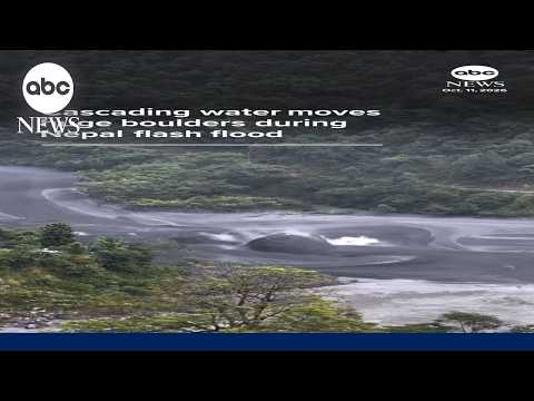 Raging waters carry huge boulders in Nepal flash flood