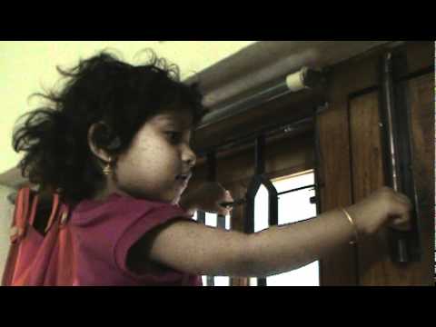 my angle baby srimayi climbling up the ladder(grill)...