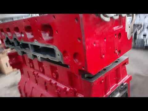 Cummins X15 engine overhaul cylinder head install.