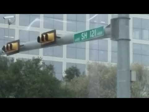 SH 121 And Legacy Avenue Traffic Lights With A Missing Direction Sign For A Pedestrain Button