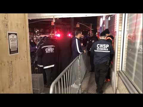 CWSP Shmira securing thousands for 8 days of Chanukah, lighting the Menorah with the Skulen Rebbe