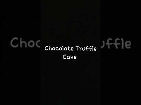 dark chocolate truffle cake/ganache cake/piping name