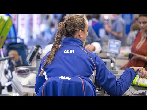The Real Reason Aldi Cashiers Sit Behind The Register
