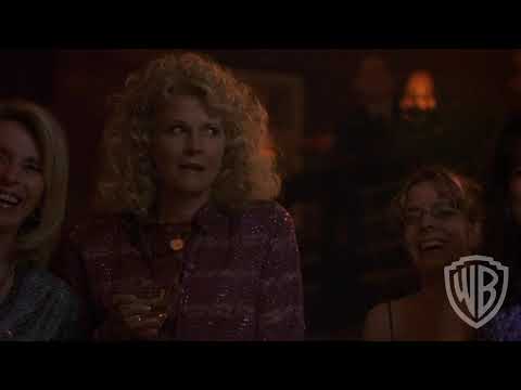 The In-Laws (2003) trailer still: Michael Douglas and Albert Brooks in tuxes racing through a wedding venue