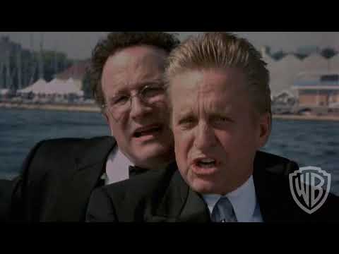 Trailer collage: ballroom lighting and dance floor wide shot hinting at the live band reveal