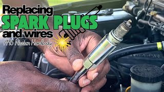 Replacing spark plugs and wires in a 95 Nissan Hardbody.