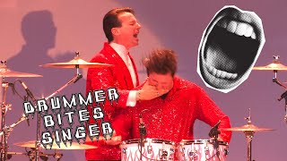 Drummer Bites Lead Singer