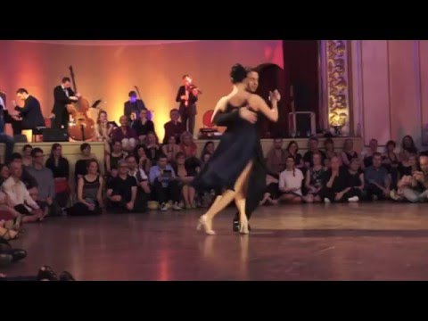  Joachim Dietiker  and  Michelle Marsidi  are  dancing  to  the  milonga  "  Mano Brava  "  by  Solo Tango Orquesta  at  TangoFest Dresden  in  2016