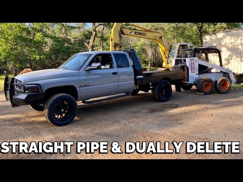 Straight pipe Cummins EXHAUST BRAKE and New wheels!!   BEST LOOKING TRUCK I OWN!
