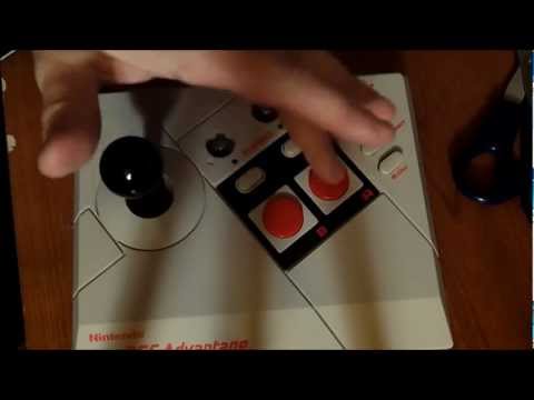Opening and fixing a NES Advantage controller .