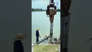 Concrete pillar installation process on the lake front satisfying