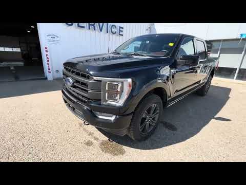 2023 Ford F-150 LARIAT 4WD SuperCrew 5.5' Box in Black for sale at HomeField Ford in Raymond, AB