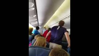 High School choir sings "Glory Hallelujah" as remains of soldier carried off plane