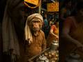 A Monkey Wearing A Towel On His Head And Wearing Clothes Like Humans Has Opened A Small Tea Ai Short