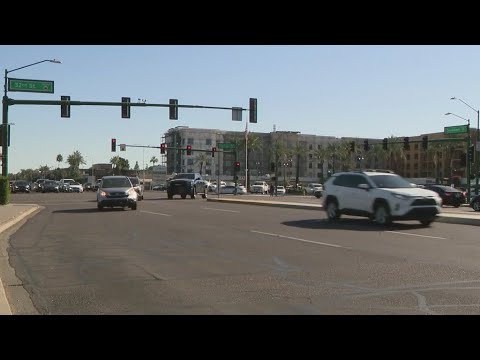 Man dies after being hit by car while crossing Phoenix street