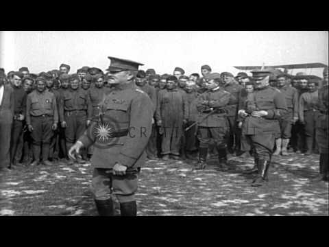General John J. Pershing speaks to pilots at an airfield and visits a camp in Tou...HD Stock Footage