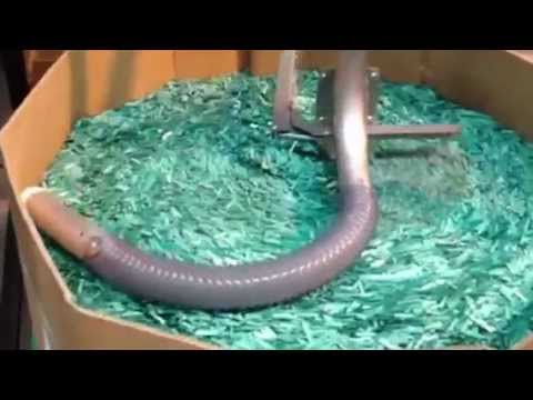 Maguire Sweeper System conveys industrial strapping off-cuts.